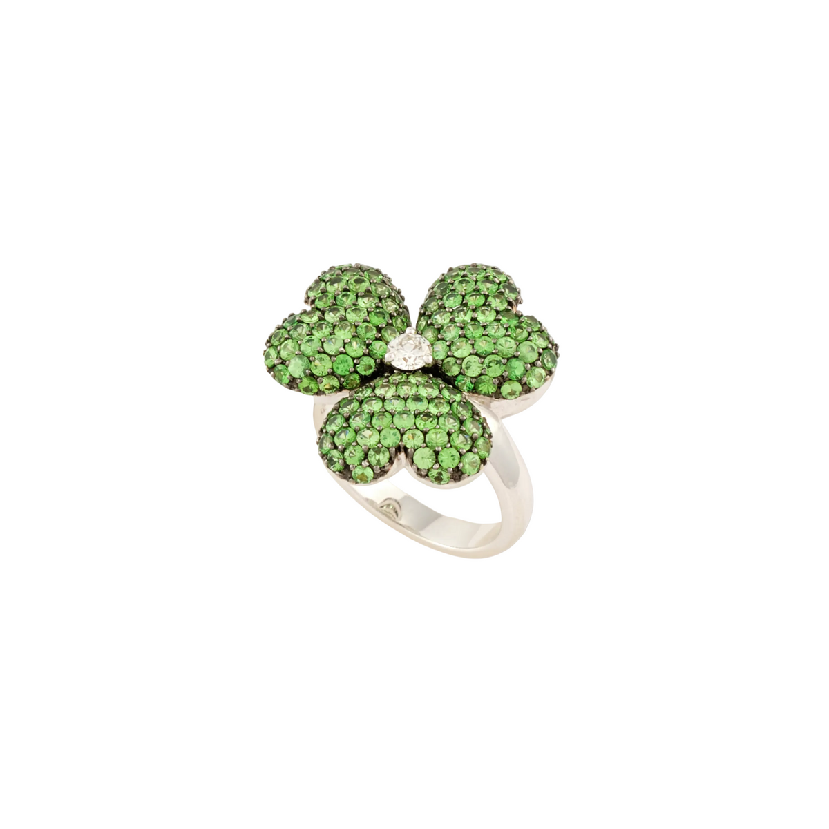 A four-leaf clover ring featuring green gemstones in a pavé setting on a silver band, centered on a plain white background.
